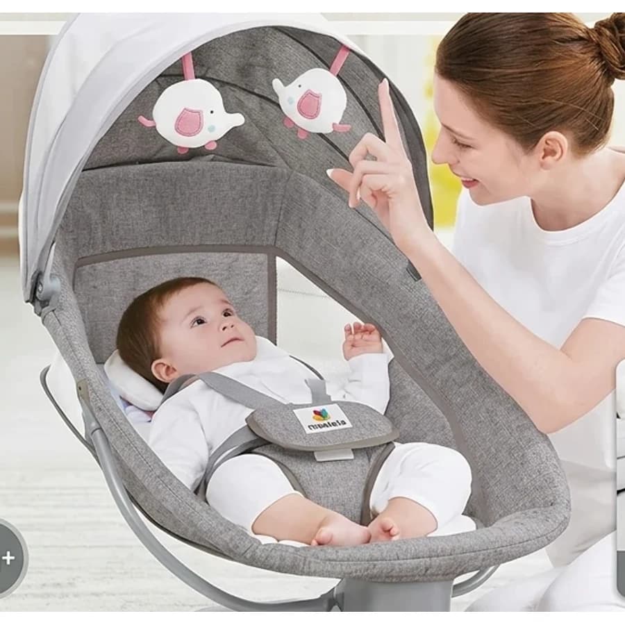 Grey Mastela 3-in-1 baby bassinet with canopy, hanging toys and seat harness