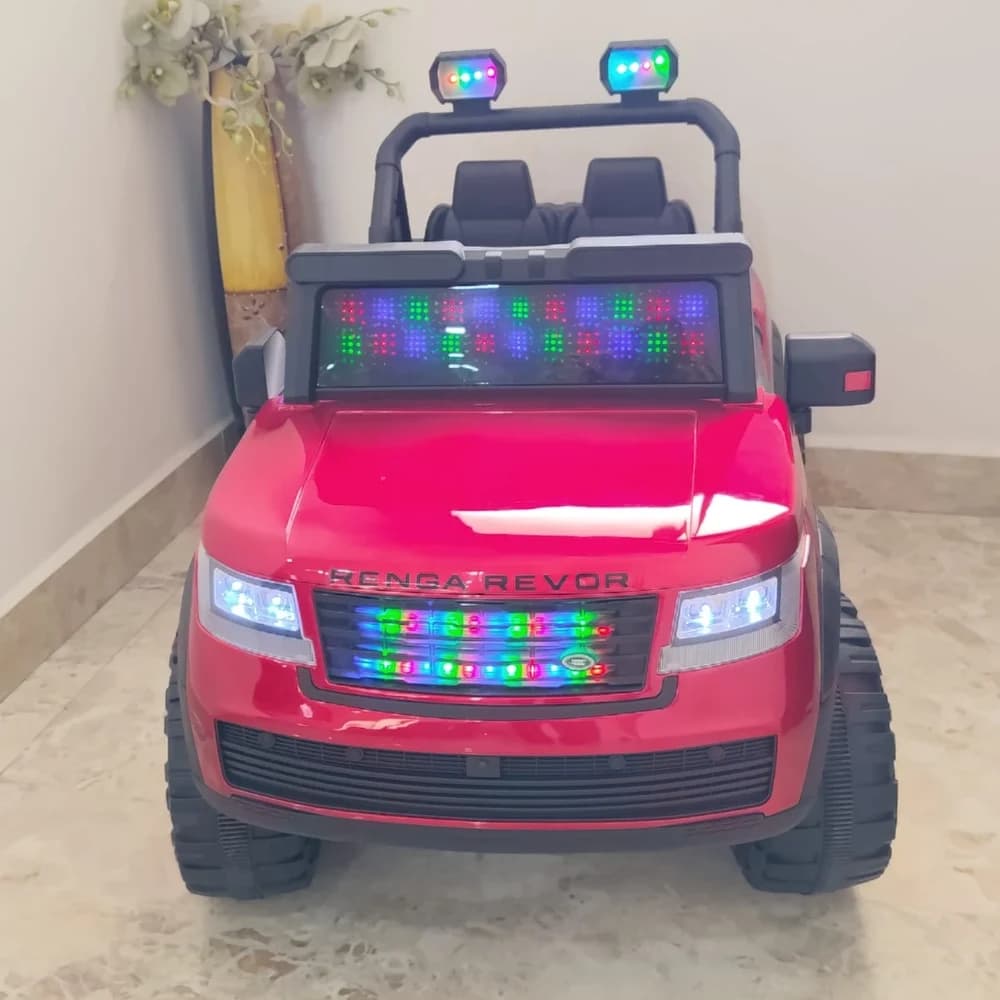 Red Range Rover-style kids ride-on car front view with LED lights on