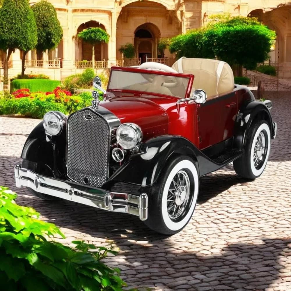 Red and black vintage car kids ride-on with cream seats